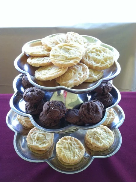 decorative display of cookies at a wedding dessert table