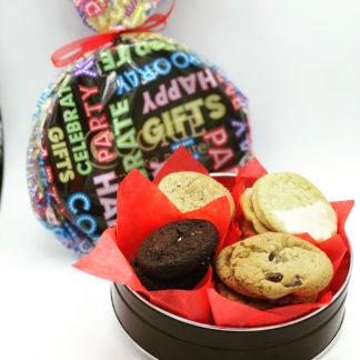 cookie tin filled with cookies and wrapped in festive wrapping