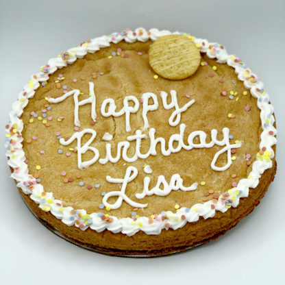 large cookie decorated with icing for birthday celebration