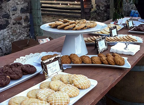 an open cookie bar at a wedding with multiple fresh baked cookies