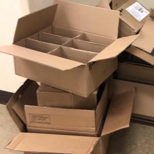 Empty cardboard boxes stacked haphazardly
