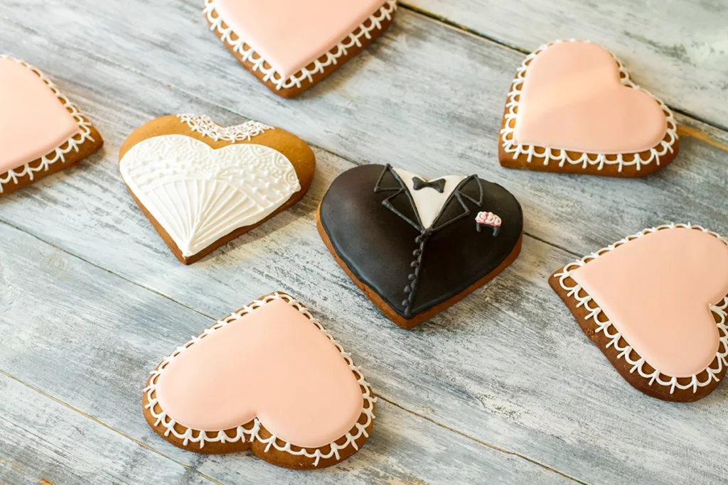 Custom wedding cookies decorated for an engagement party 