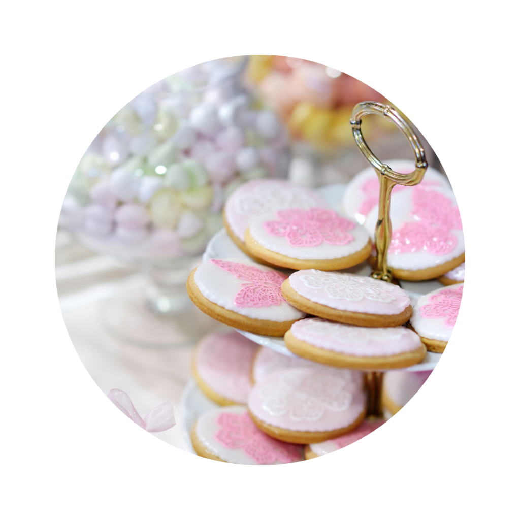 A display of custom cookies with seasonal designs for valentine's day.